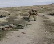 Arcax soldier shows the aftermath of an Azeri offensive near a road. Unknown location. from azeri