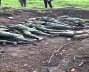 As the Russian forces were pushed back from around the village of Olkhovka, Kharkiv region, an open mass grave of &#34;LPR&#34; soldiers was found by Ukrainian forces. The bodies are badly decomposing and yet left uncovered by the Russians. from mountains around the village