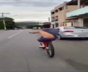 Boy is doing some tricks with a bike from bike o