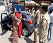 A group of indian prostitutes freak out after cops fine them for being outside and note their cars license plate number. This lady tells the cops here note my pussys number too before flashing them from group of indian col