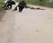 KNU Soldiers of the Lion Battalion led by the one-armed Captain, Saw Eh Say Wah, film the graphic aftermath of an ambush on Sit-Tat forces. from knu
