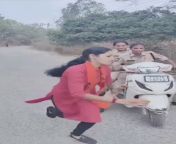 Telangana police grab ABVP Woman Activist by hair while on Activa from telangana villag