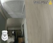 Domestic violence suspect gets aggressive with wife and cop while officer tries to escort her away from their hotel room, cop later comes back and arrests him for battery. from dhga honymoon cop