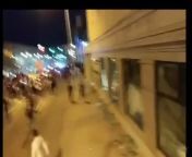 Man gets jumped by a bunch of rioters after telling them to stop breaking windows of a business. While getting beaten by the mob in fear of his life, he takes out a gun and fires a shot in the air which ultimately disperses the mob and has them running in from sexi tube mob