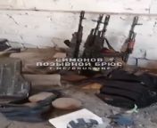 Wagner PMC take a video of a overrun Ukrainian position in Krasna Hora. Multiple dead bodies are visible, captured weapons and ammunition are visible. from visible